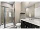 Modern bathroom with a glass-enclosed shower, sleek vanity, and neutral tones at 752 Winton Way, Atlanta, GA 30312