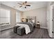Cozy bedroom featuring a comfortable bed, soft lighting, and hardwood floors at 752 Winton Way, Atlanta, GA 30312