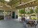 Attractive outdoor community space featuring picnic tables, a bar and grill, and natural surroundings at 752 Winton Way, Atlanta, GA 30312