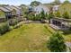An aerial view of the community green, showcasing the landscaped lawn and gathering areas for residents at 752 Winton Way, Atlanta, GA 30312