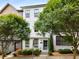 Attractive two-story home with white brick, mature trees, and well-maintained landscaping at 752 Winton Way, Atlanta, GA 30312