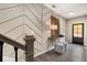 View of the foyer showing the decorative wall accents, console table, and staircase at 752 Winton Way, Atlanta, GA 30312