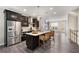 Spacious kitchen with stainless steel appliances, a central island, and hardwood floors at 752 Winton Way, Atlanta, GA 30312