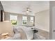 Bright main bedroom with neutral colors, ample natural light, and a ceiling fan at 752 Winton Way, Atlanta, GA 30312