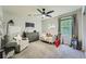Bedroom featuring a ceiling fan, natural light, and neutral colors at 3005 Park Chase, Alpharetta, GA 30022