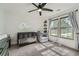 Bedroom with hardwood floors, crib, rocker, and lots of natural light at 3005 Park Chase, Alpharetta, GA 30022
