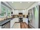 Beautiful kitchen featuring granite counters, stainless steel appliances, and natural light at 3005 Park Chase, Alpharetta, GA 30022