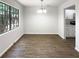 Inviting dining room with hardwood floors and a chandelier at 3008 Pine Tree Trl # 16D, Atlanta, GA 30349