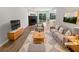 Inviting living room featuring a stone fireplace and neutral decor at 3008 Pine Tree Trl # 16D, Atlanta, GA 30349