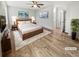 Serene main bedroom with warm wood floors and plenty of natural light at 3008 Pine Tree Trl # 16D, Atlanta, GA 30349