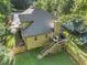 Aerial view of the home with a spacious backyard and deck at 1156 Magnolia Dr, Villa Rica, GA 30180