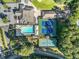 Overhead view of clubhouse with tennis courts and pool, neatly arranged and well-maintained at 1156 Magnolia Dr, Villa Rica, GA 30180