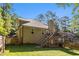 Charming backyard with fenced yard, deck and stairs, perfect for outdoor activities and privacy at 1156 Magnolia Dr, Villa Rica, GA 30180