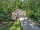 Beautiful two-story home with a well-kept lawn and mature trees, providing a sense of privacy at 1156 Magnolia Dr, Villa Rica, GA 30180