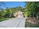 Charming two-story home featuring a two-car garage, well-maintained lawn, and a cozy front porch at 1156 Magnolia Dr, Villa Rica, GA 30180