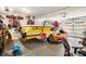 Spacious garage filled with watercraft and equipment, offering ample storage and easy access to outdoor adventures at 1156 Magnolia Dr, Villa Rica, GA 30180