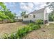 The backyard features a wooden fence, patio and green vegetation at 2669 Jefferson Terrace Ter, East Point, GA 30344