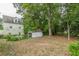 Large backyard with wooded area and shed for storage at 2669 Jefferson Terrace Ter, East Point, GA 30344