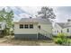 The backyard has stairs that lead up to the back of the house at 2669 Jefferson Terrace Ter, East Point, GA 30344