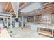 Unfinished basement featuring washer and dryer, exposed ductwork, and concrete flooring at 2669 Jefferson Terrace Ter, East Point, GA 30344
