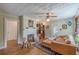 Comfortable living room with hardwood floors, fireplace, and stylish mid-century modern furnishings at 2669 Jefferson Terrace Ter, East Point, GA 30344