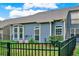 Charming backyard with well-maintained lawn, iron fence, and blue exterior at 2685 Sardis Chase Ct, Buford, GA 30519