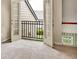 Carpeted balcony with metal railing and backyard view at 2685 Sardis Chase Ct, Buford, GA 30519