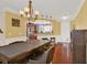 Bright dining room with hardwood floors, and direct sightlines to the updated kitchen at 2685 Sardis Chase Ct, Buford, GA 30519