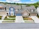 Beautiful townhomes showcasing well-kept lawns, driveways, and attractive landscaping at 2685 Sardis Chase Ct, Buford, GA 30519