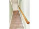 Stairway with carpeted steps and wooden handrail at 2685 Sardis Chase Ct, Buford, GA 30519