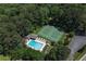 Aerial view of community featuring a sparkling pool and tennis courts at 4655 Latimer Ne Ct, Kennesaw, GA 30144