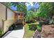 Backyard featuring a screened porch, lush lawn, and private surroundings at 4655 Latimer Ne Ct, Kennesaw, GA 30144