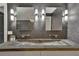 Bathroom featuring a vessel sink with double mirrors and sconces, offering a sleek and contemporary design at 4655 Latimer Ne Ct, Kennesaw, GA 30144