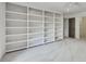 Bedroom with built in shelves and custom closet create lots of storage space at 4655 Latimer Ne Ct, Kennesaw, GA 30144