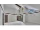 Bright bedroom with vaulted ceilings, transom windows, and access to private balcony at 4655 Latimer Ne Ct, Kennesaw, GA 30144