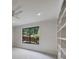 Bright bedroom with a large window and built-in shelving, offering a stylish and functional space at 4655 Latimer Ne Ct, Kennesaw, GA 30144