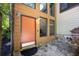 Inviting front entrance with a tiled porch and stylish front door, complete with modern lighting fixtures at 4655 Latimer Ne Ct, Kennesaw, GA 30144