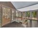 Open hallway with hardwood floors, lots of natural light, and views into adjacent rooms for an airy feel at 4655 Latimer Ne Ct, Kennesaw, GA 30144