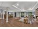 Finished basement features hardwood floors, bar area, stone fireplace, and a walkout to the backyard at 4655 Latimer Ne Ct, Kennesaw, GA 30144