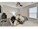 Bedroom with ceiling fan and a desk at 10000 Barston Ct, Johns Creek, GA 30022