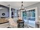 Eat-in kitchen with a breakfast table and chairs and access to a private deck at 10000 Barston Ct, Johns Creek, GA 30022