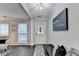 Bright living area featuring hardwood floors, and decorative art pieces, creating a cozy feel at 10000 Barston Ct, Johns Creek, GA 30022