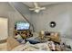 Cozy living room featuring large TV, plush couches, and an open, inviting layout at 10000 Barston Ct, Johns Creek, GA 30022