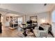 Bright and spacious open floor plan seamlessly integrating the living room and dining area at 10000 Barston Ct, Johns Creek, GA 30022