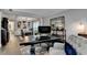 Open-concept space showcasing living and dining areas with tasteful decor and natural light at 10000 Barston Ct, Johns Creek, GA 30022