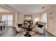 Well-lit living area with elegant seating and modern decor, perfect for relaxing or entertaining at 10000 Barston Ct, Johns Creek, GA 30022