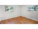 Bedroom featuring hardwood floors and two windows for lots of natural light at 2215 Springdale Sw Rd, Atlanta, GA 30315