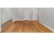 Living room featuring refinished hardwood floors and a spacious layout at 2215 Springdale Sw Rd, Atlanta, GA 30315
