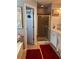 Bright bathroom with glass enclosed shower, tile floors and white vanity at 3692 Ramsey Cir, Atlanta, GA 30331