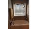 Large soaking tub with tile surround, window and decorative accents at 3692 Ramsey Cir, Atlanta, GA 30331